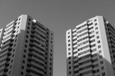 Low angle view of modern office building against sky