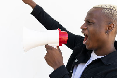 Portrait of man against white background