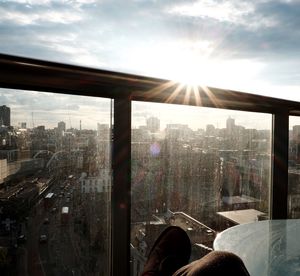 View of cityscape through window