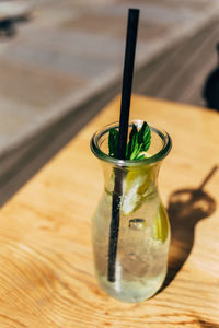 Close-up of lemonade served on table