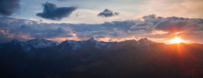 Scenic view of mountains against sky during sunset