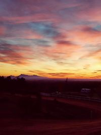 Scenic view of dramatic sky during sunset