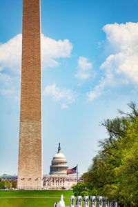 Low angle view of historical building against cloudy sky