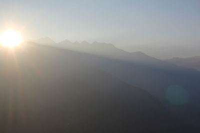 Scenic view of mountains against sky during sunset