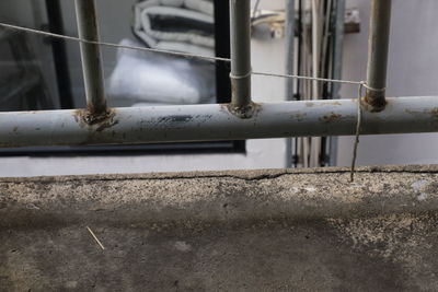 Close-up of metal pipe on wall