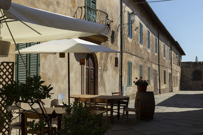 View of the main street of populonia and a restaurant