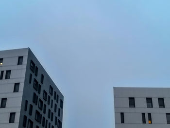 Low angle view of modern building against clear sky