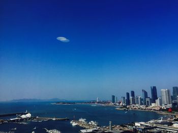 Scenic view of sea against blue sky