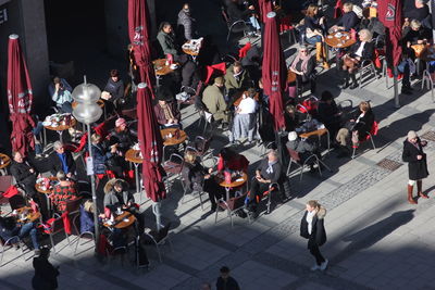 High angle view of people walking on street