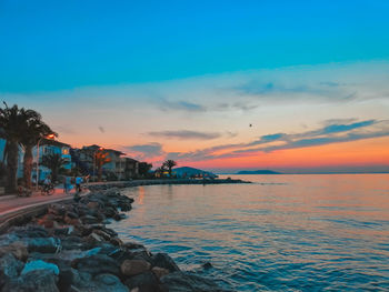 Scenic view of sea against sky during sunset