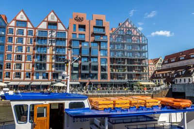 Buildings against blue sky in city