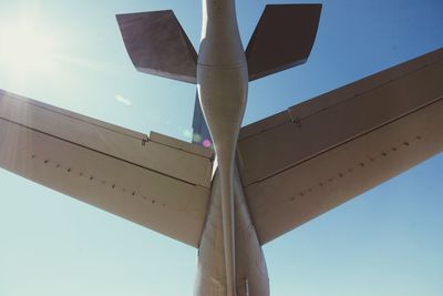 Low angle view of airplane against clear sky