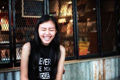 Portrait of smiling young woman