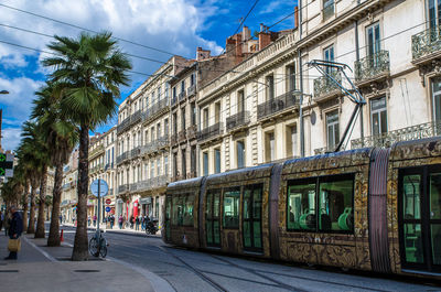 Buildings in city against sky