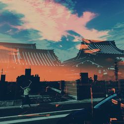 Silhouette of city against sky during sunset