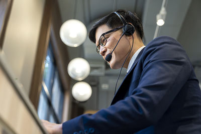 Side view of man working