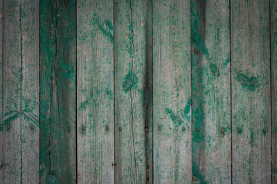 Wooden logs of an old house. close-up. weathered natural gray wood texture. background. 