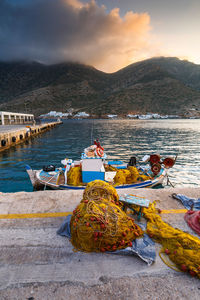 Fishing boat in the port of kamares village early in the morning.