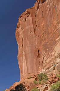 Low angle view of rock formation against sky