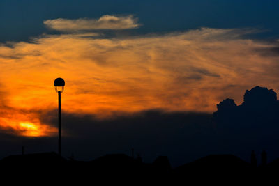 Low angle view of silhouette orange sky