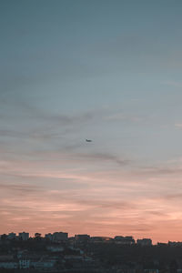 View of cityscape against sky during sunset