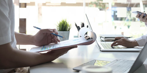 People using laptop on table