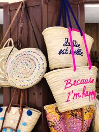 Close-up of bags hanging at market stall