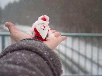 Midsection of person holding ice cream