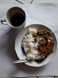 High angle view of breakfast served on table