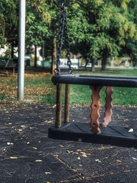 Full length of children on swing in park