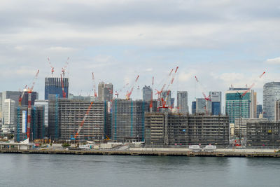 View of buildings in city against sky