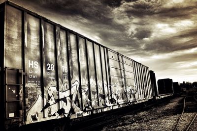 Train on railroad tracks against sky