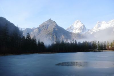 Scenic view of snowcapped mountains against sky