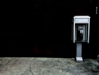 Low angle view of telephone booth