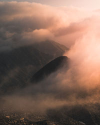 Scenic view of mountains against sky during sunset