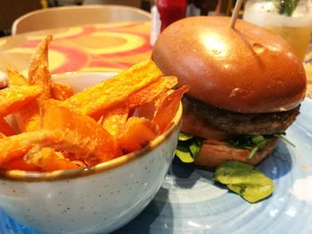 Close-up of burger in plate on table