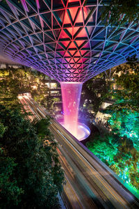 Illuminated bridge at night