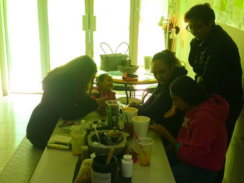 Rear view of people sitting at restaurant