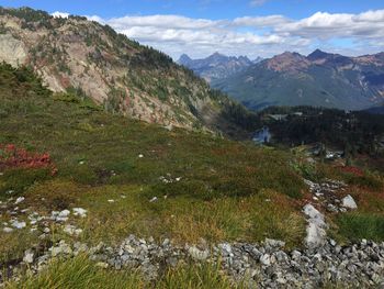 Scenic view of landscape and mountains against sky