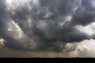 Storm clouds over landscape