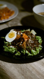 Close-up of food in plate on table