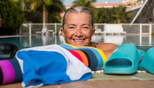 Portrait of smiling man in swimming pool