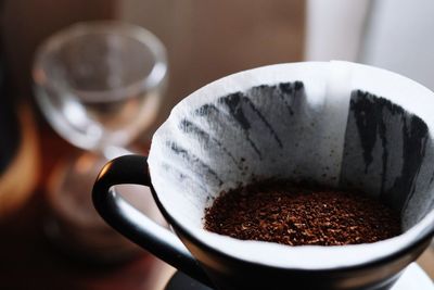 Close-up of coffee cup on table