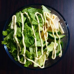 High angle view of chopped vegetables in bowl on table