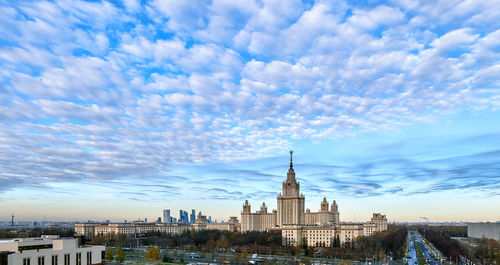 Buildings in city against sky