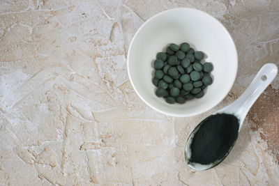 High angle view of roasted coffee beans on table