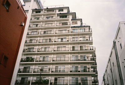 Low angle view of residential building against sky