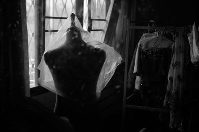 Close-up of clothes hanging on clothesline at home