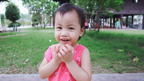 Portrait of cute girl outdoors