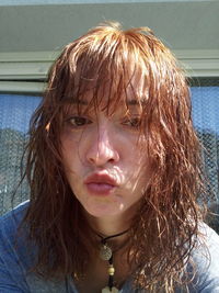 Close-up portrait of young woman